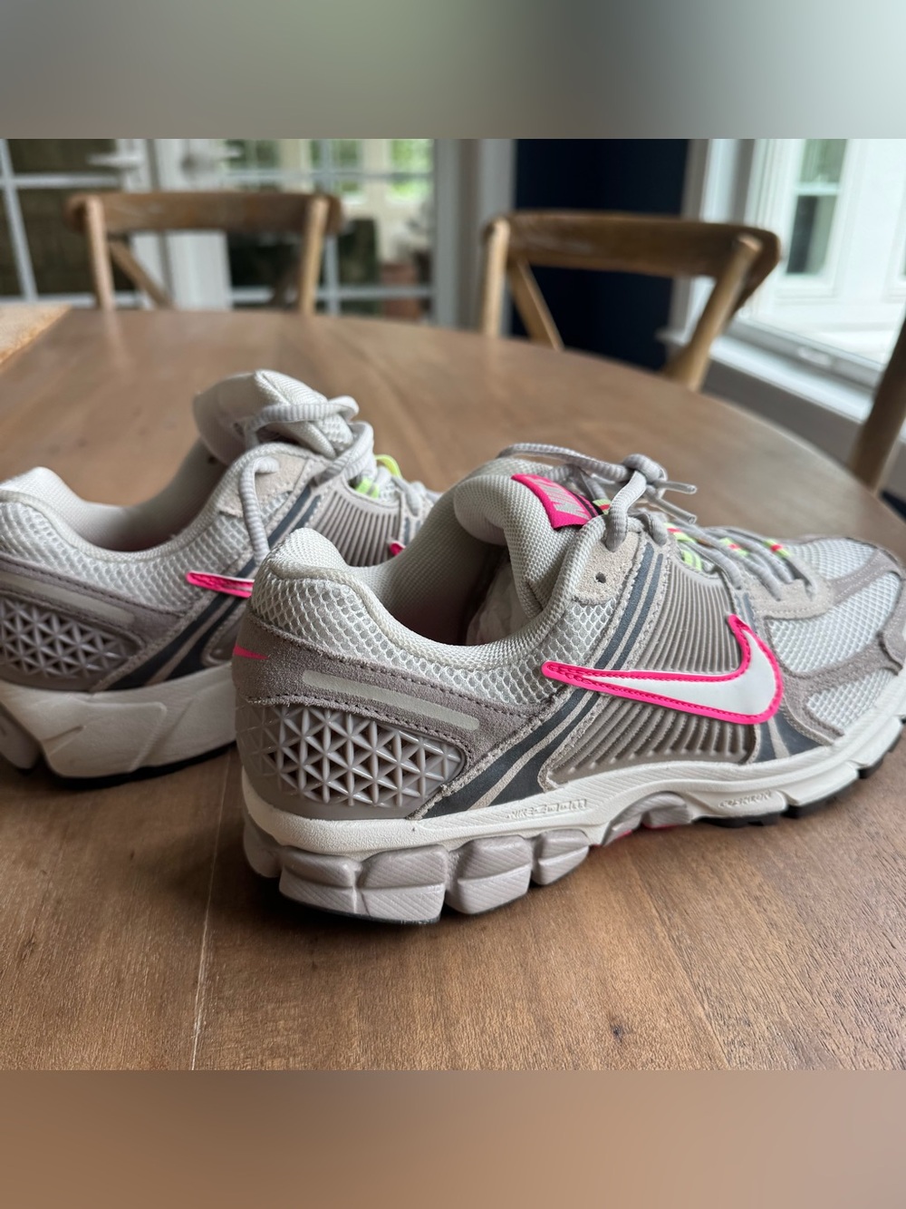 Nike women's Vomero. Greyish and Hot Pink Athletic Sneakers